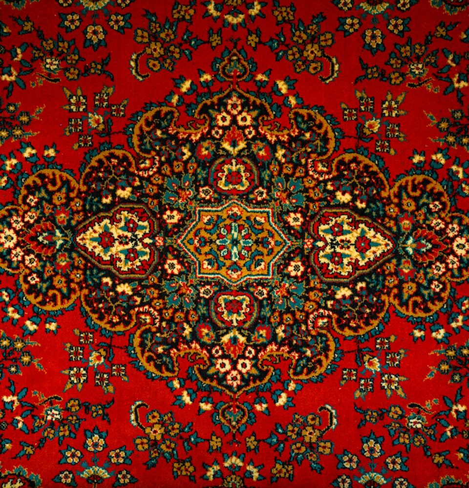 a red carpet with a colorful design on it